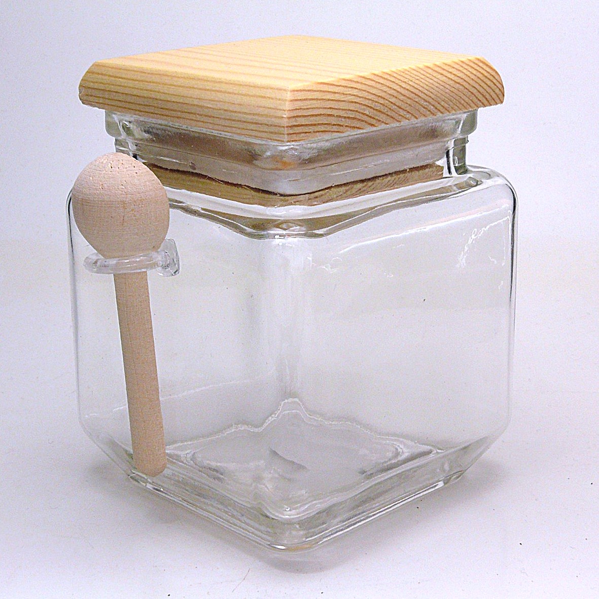 Glasbehälter mit Holzdeckel und Löffel - hier bestellen